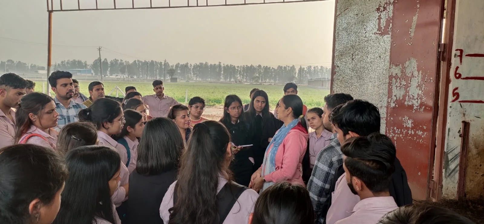 Group training session with participants learning mushroom farming